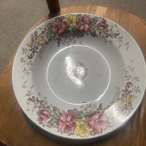 Plat rond creux en faïence - en,